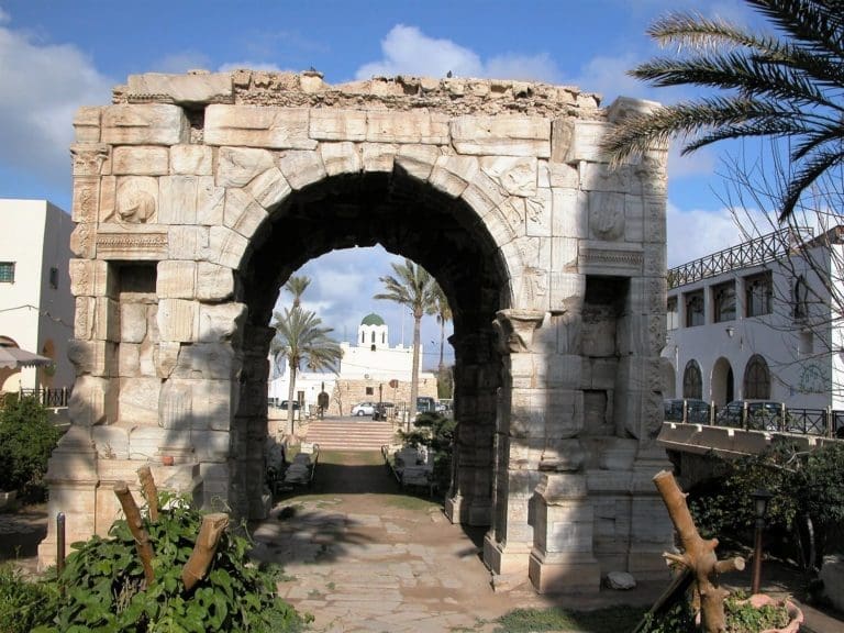 The arch of Marcus Aurelius frames a mosque, Tripoli