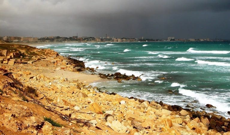 Waves on the turquoise waters of Tripoli Bay