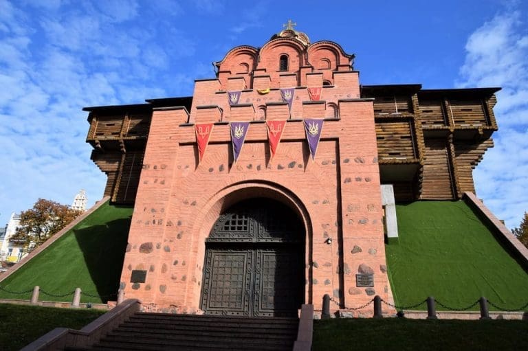 The Golden Gate reconstruction brick archway and wooden fort