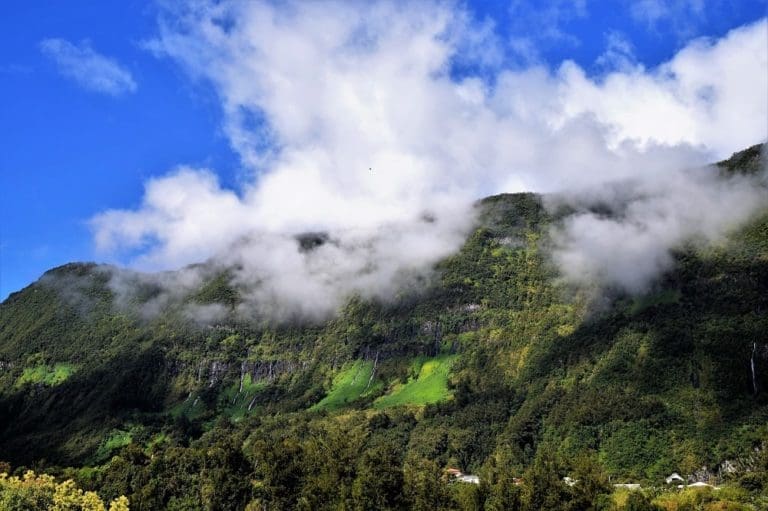 Clouds floating in front of the waterfalls of Salazie Reunion