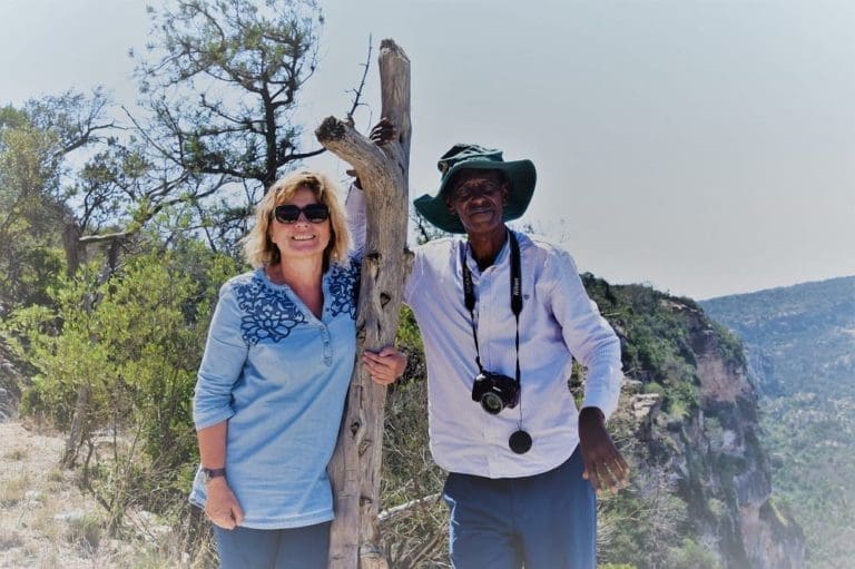 Sue and Mohammed sating on the ridge at Ga'an Libah