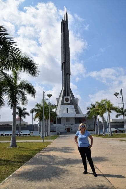 Sue in front of President Neto's Monument Luanda Angola