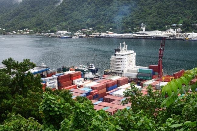 Containers stacked by a container ship in Pago Pago, the capital of American Samoa harbour