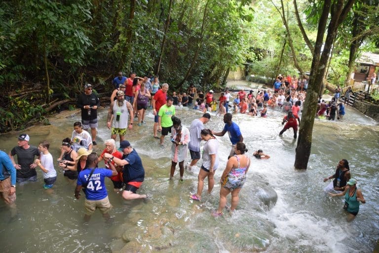Tourists climbing up Dunn's River Falls, Jamaica